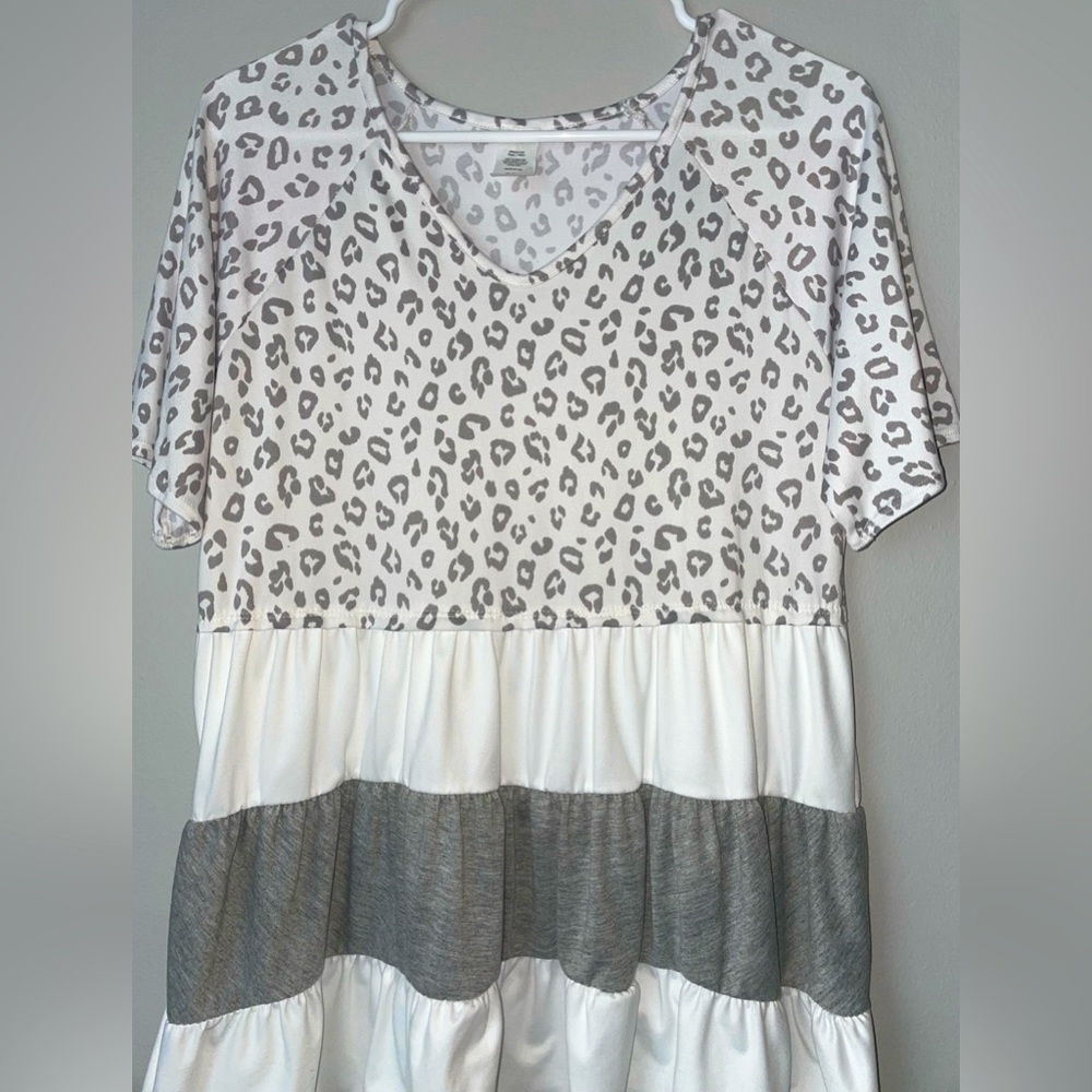 Boutique Grey and White Leopard Babydoll Top. Size Small.